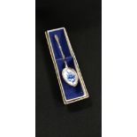 SILVER AND ENAMEL SPOON