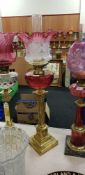 ANTIQUE BRASS OIL LAMP RUBY BOWL AND RUBY TIPPED SHADE