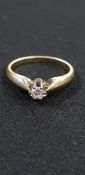 15CT GOLD AND DIAMOND SOLITAIRE RING