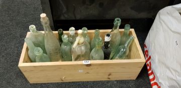 REDWOOD PLANTER WITH LOCALLLY NAMED BOTTLES