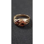 9CT GOLD GENTS SNAKE RING SET WITH GARNETS