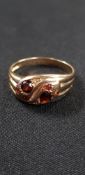 9CT GOLD GENTS SNAKE RING SET WITH GARNETS