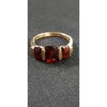 9CT GOLD GARNET AND DIAMOND RING - 3.4 GRAMS