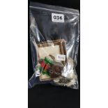 BAG OF MILITARY BADGES AND MEDALS