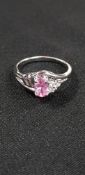 18CT DIAMOND AND PINK TOPAZ RING