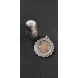 SILVER THIMBLE AND SILVER MEDAL