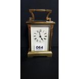 ANTIQUE BRASS CARRIAGE CLOCK AND KEY