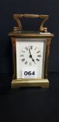 ANTIQUE BRASS CARRIAGE CLOCK AND KEY
