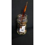 JAR OF PEN NIBS AND PEN