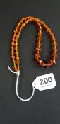 1920'S ART DECO AMBER GLASS GRADUATED BEAD 9' NECKLACE