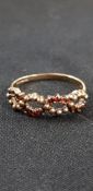 9CT GOLD AND GARNET RING