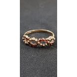 9CT GOLD AND GARNET RING