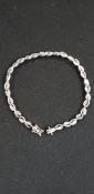 9CT WHITE GOLD AND DIAMOND BRACELET