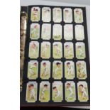 FOLDER OF CIGARETTE CARDS