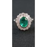 PLATINUM SET EMERALD AND DIAMOND RING