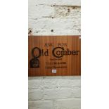 CARVED COMBER WHISKEY PLAQUE