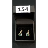 PAIR OF 9CT GOLD AND DIAMOND EARRINGS