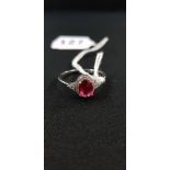 SILVER OVAL CUT SYNTHETIC RUBY & CZ RING