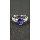 18CT TANZANITE AND DIAMOND RING