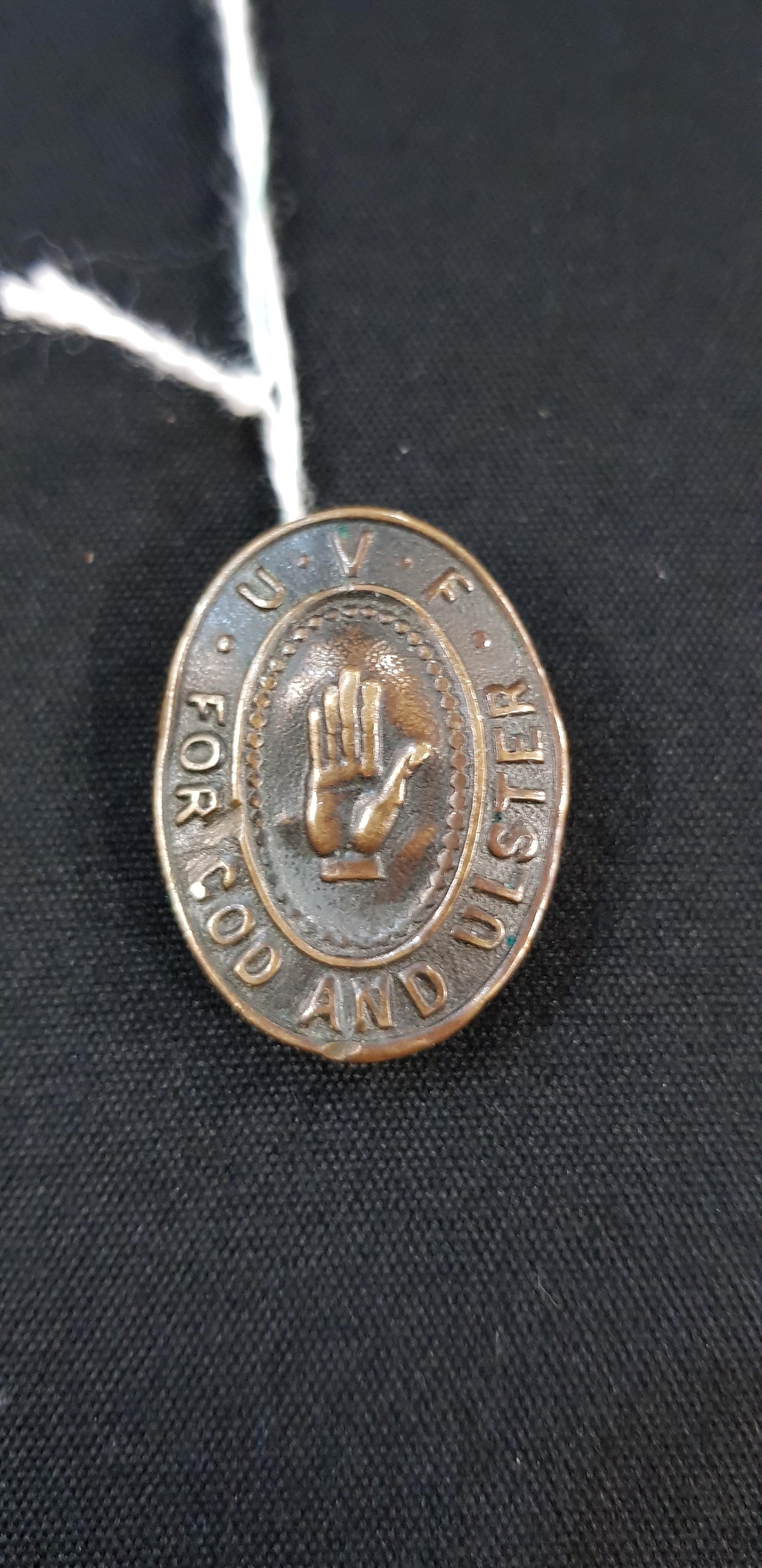 UVF LAPEL BADGE - LETTER 'L' ON BACK AND NUMBERED 4611