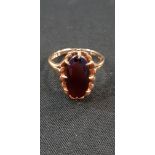 9CT GOLD AND GARNET RING