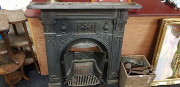 CAST IRON FIRE SURROUND AND FIRE GRATE