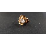 18CT GOLD RING WITH DIAMOND CHIPS AND CZ CENTRE STONE