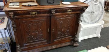 HEAVILY CARVED SIDEBOARD