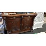 HEAVILY CARVED SIDEBOARD