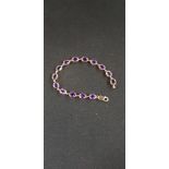 9 CARAT GOLD & AMETHYST BRACELET