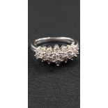 9CT WHITE GOLD AND DIAMOND RING WITH CIRCA HALF CARAT OF DIAMONDS