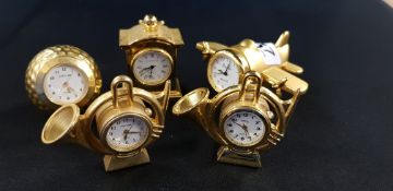 QUNATITY OF BRASS MINIATURE CLOCKS