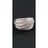 WHITE GOLD AND DIAMOND TWIST STYLE RING