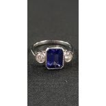 PLATINUM SET 3 STONE TANZANITE (2.85 CARATS) AND DIAMOND (0.6 CARAT) RING