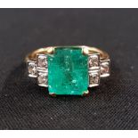 18 CARAT YELLOW GOLD EMERALD & DIAMOND RING WITH 0.20 CARAT OF DIAMONDS & 2.75 CARAT EMERALD