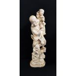 CARVED ORIENTAL FIGURE