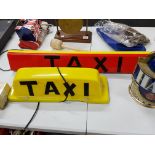 2 TAXI SIGNS