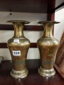 MATCHING PAIR OF BRASS PEACOCK ENGRAVED URNS