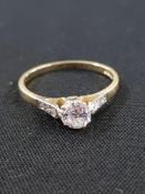 18CT GOLD DIAMOND SOLITAIRE (0.50 CARAT) WITH DIAMOND SHOULDERS