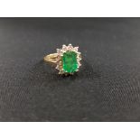 18 CARAT YELLOW GOLD EMERALD & DIAMOND RING WITH CIRCA HALF CARAT OF DIAMONDS