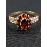 9 CARAT GOLD GARNET CLUSTER RING