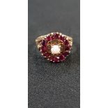 9CT GOLD GARNET AND OPAL RING