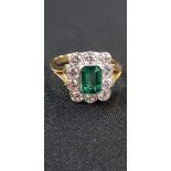 18 CARAT YELLOW GOLD EMERALD & DIAMOND RING WITH 1 CARAT OF EMERALD & 0.90 CARAT OF DIAMONDS