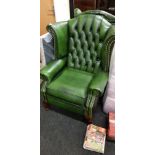 GREEN LEATHER BUTTON BACK ARMCHAIR