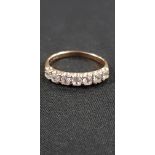 9 CARAT GOLD 7 STONE SPINEL RING