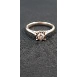 9 CARAT WHITE GOLD DIAMOND SOLITAIRE RING WITH QUARTER CARAT OF DIAMONDS