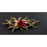 HEAVY UNIQUE 18 CARAT GOLD BROOCH (TESTED TO) SET WITH A 7 CARAT RUBY