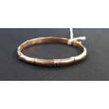 9 CARAT GOLD BANGLE CIRCA 8.1 GRAMS