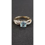 9CT GOLD DIAMOND AND BLUE TOPAZ RING