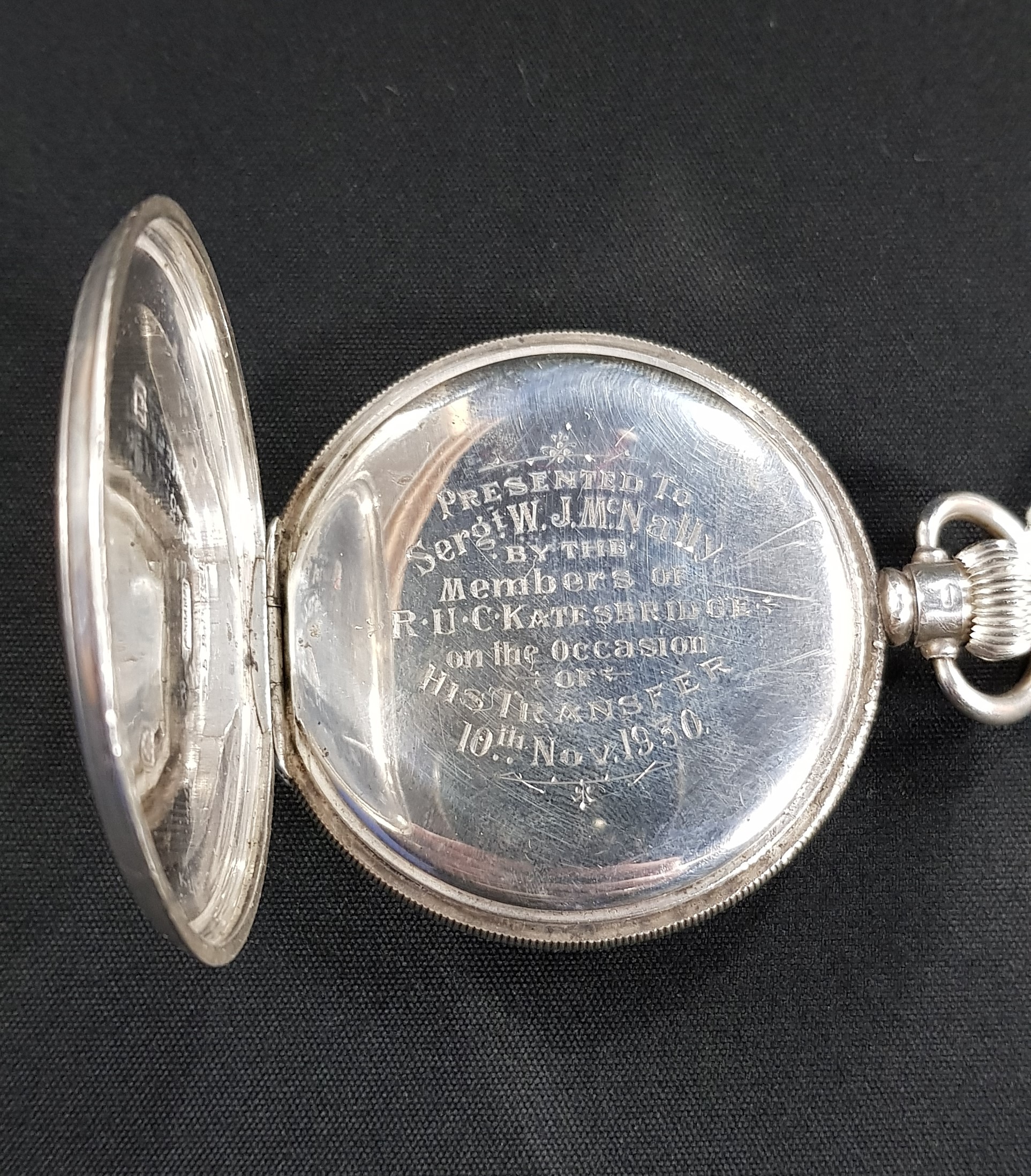 SILVER RUC POCKET WATCH INSCRIBED - PRESENTED TO SERGT W.J.MCNALLY BY THE MEMBERS OF R.U.C